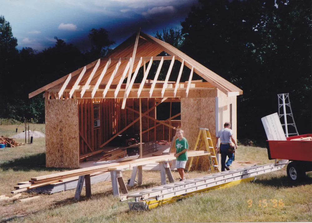 James Cloud and his father building in 1996